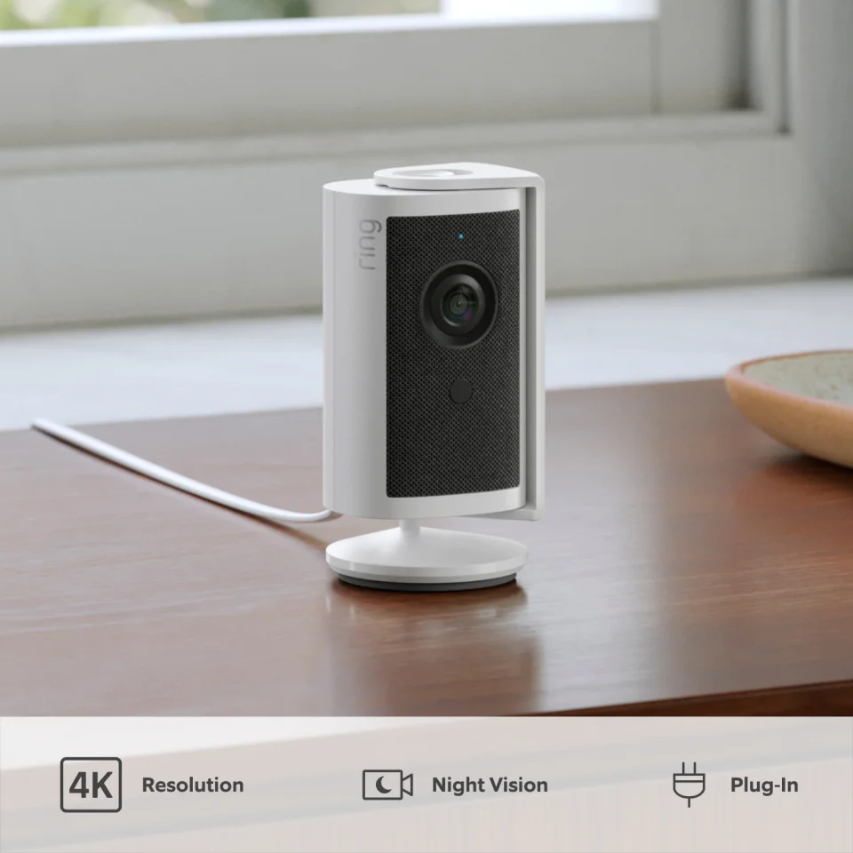 Ring Indoor Cam 4K on a wooden table in a living room