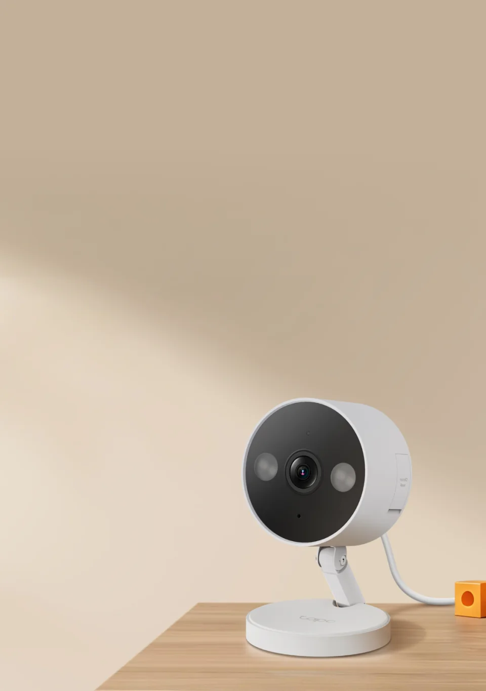 Tapo C120 indoor camera on a table at home